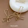 Brinco de Flor Torcida com Laço para Lanterna de Vento de Metal Moda Versátil Brinco com Sensação de Luxo Brinco com Design de Nicho Pequeno