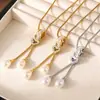 Collar con colgante de perla de imitación, estilo europeo y americano, de lujo, con hebilla de anillo y borla de amor, de acero inoxidable, chapado en oro, superpuesto, joyería para mujer.