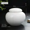 Cerámica de Porcelana Blanca Hogareña Sellada Lata de Té Almacenamiento Portátil Viaje Almacenamiento de Té Simple Pequeño Almacenamiento a Prueba de Humedad