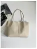 Bolsa de Textura Trançada Grande Capacidade Estilo Coreano Feminina 2026 Retrô Nova Bolsa de Ombro Único Mãe-Filho Bolsa Tote Moda para o Dia a Dia Tendência