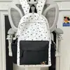 Mochila para niña de primaria, ultraligera y que reduce la carga, adecuada para estudiantes de secundaria, mochila casual versátil y popular para ir a la escuela