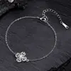 Rakol Aliexpress Conjunto de Dois Colares com Pingente de Cruz Cheio de Diamantes Estilo Coreano e Brincos de Tarraxa para Mulheres Lote Misto