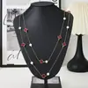 Nl-128 Collar de Trébol de Cuatro Hojas de Goteo de Aceite de Doble Capa Apilado Largo Moda Versátil Cadena para Suéter Accesorios de Otoño e Invierno Venta al por Mayor