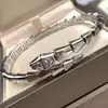 Pulsera elástica en forma de serpiente Baojia para mujer, chapada en oro rosa de 18 quilates, exquisitamente elaborada con diseño de hueso de serpiente de diamantes completos, ajustable