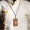 Venda Direta de Fábrica de Novos Produtos: Pingente Escultura em Madeira de Águila (Agarwood) Espírito da Montanha Pixiu com Incrustação de Cobre, Pingente de Design Original, Acessório Amuleto Budista