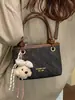 Bolsa de balde de nicho de alta qualidade para mulheres, nova bolsa versátil de outono de 2026, bolsa transversal popular para ir ao trabalho