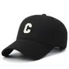Nueva gorra de béisbol marca de moda para hombre y mujer sombrero para el sol letra de tela gorra deportiva moda juvenil sombrero de pico de pato venta al por mayor