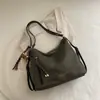 Bolsa de mano casual estilo coreano para mujer, nueva colección 2026, cuero suave, gran capacidad, bolso de hombro, se puede llevar debajo del brazo o como mochila, adecuado para ir al trabajo