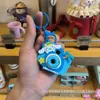 Llavero de Cámara de Proyección de Dibujos Animados Sanrio Colgante para Bolso Juguete para Niños Colgante Luminoso Pequeño Regalo Venta al por Mayor