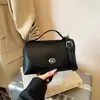 Bolso cuadrado pequeño para mujer, nuevo modelo primavera 2026, bolso de mano para mujer con patrón de lichi, bolso cruzado, bolso de hombro versátil para el día a día para mujer