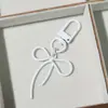 Llavero DIY Creativo de Aleación Hueca con Forma de Lazo con Colgante de Corazón de Colores Encanto para Bolso Corazón Femenino