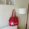 Bolsa de ombro casual de grande capacidade, estilo novo para primavera e verão, para estudantes, adequada para a aula e o trajeto diário, bolsa tote simples e estilosa para mulheres