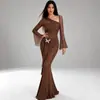 Vestido de estilo europeo transfronterizo con hombro asimétrico y manga acampanada para mujer, decoración de lazo, manga larga ligeramente transparente, vestido maxi de sirena