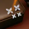 Pendientes Magnéticos de Flor de Cuatro Pétalos con Circonita Aguja de Plata para Mujer Estilo Coreano Pequeños Frescos Estilo Ins Pendientes Simples Dulces Venta al por Mayor