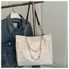 Bolsas Femininas de Nicho de Luxo 2025 Nova Moda Tendência Bolsa de Ombro Texturizada Bolsa Tote Fofa Versátil de Grande Capacidade
