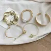 Conjunto de pulseiras de pérola redonda com contas transfronteiriças europeias e americanas, design versátil, pulseira aberta, sensação moderna e de alta qualidade
