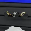 Anillo de Diseñador Nuevo Estilo Europeo y Americano Transfronterizo con Logo y Diseño Floral Incrustado de Diamantes para Mujer, Sensación de Alta Gama, Fotos Reales, Anillo Ajustable, Venta al por Mayor
