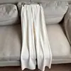 Novo estilo 2026, calça longa elegante, confortável, elástica, modeladora, levemente flare para mulheres, atacado H15DK17089