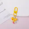 Llavero de Oso con Lazo de Puntos de Colores Lindo Dibujo Animado Colgante Pequeño Llavero de Cuentas DIY Suministro al por Mayor