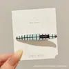 Lindo pasador de pelo de gatito negro, moderno y versátil para mujeres, perfecto para sujetar el flequillo y el cabello lateral, con un diseño de pinza de pico de pato de alta gama