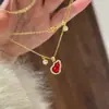 Colgante de Collar de Bayas Recubierto de Azúcar Doble Cara Nuevo Anillo Fulu de Esmalte Glaseado Chino de Nicho Pendientes de Diamante Rojo de Alta Calidad para Mujer
