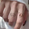 Tatuajes temporales lindos y relajantes con temática de animales, diseños de líneas simples para las articulaciones de los dedos, pequeñas pegatinas impermeables y duraderas