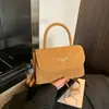 Bolso Pequeño Cuadrado Retro Estilo Hong Kong Hombro Único 2026 Nuevo de Moda Diseño de Nicho Moda Color Sólido Bolso de Hombro Cruzado de Alta Gama