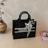 Bolsa de Grande Capacidade Feminina Novo Estilo 2026 Bolsa de Ombro Único da Moda Moda de Verão Celebridade da Internet Mais Vendida Bolsa Tote Bolsa de Mão para o Dia a Dia