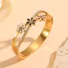 Versátil Transfronterizo Acero Inoxidable Electrochapado al Vacío Joyería Flor Pequeña Patrón de Ojo Varios Brazaletes para Mujer Brazaletes de Diamante