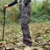 Pantalones de trabajo para exteriores estilo americano para hombre, adecuados para primavera y otoño, diseñados para senderismo y montañismo, con un corte holgado y recto, duraderos y con múltiples bolsillos, lo que los convierte en pantalones largos casuales