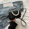 Bolso de noche de lujo ligero nuevo, bolso de mano simple con adornos de perlas, bolso de mano para mujer, adecuado para ropa formal y cheongsam, bolso cruzado de moda