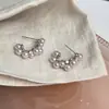 Pendientes de perlas C-shaped de estilo francés, lujo ligero con un toque de alta gama, hacen que las caras redondas parezcan más pequeñas, pendientes de moda y versátiles