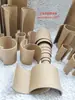 Tubos de papelão semicirculares para artesanato, incluindo materiais para construir azulejos artesanais, mesas de pingue-pongue e pistas de carros, bem como tubos de papel kraft
