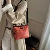 Nuevo diseño de nicho transfronterizo estilo japonés ins casual simple moda bolsa de hombro para teléfono de nailon bolsa cruzada a cuadros