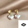 Brincos Femininos Retro de Alta Qualidade com Pino de Prata 925 Coração 2025 Novos Populares Acessíveis Luxo Nicho Brincos Elegantes