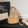Bolso de hombro casual de dibujos animados nuevo y lindo, bolso cruzado moderno y único, bolso de axila elegante, bolso tote casual para mujer
