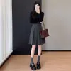Falda plisada de lana negra para mujer, nueva colección otoño 2026, de cintura alta, estiliza la figura, de longitud media, falda de línea A estilo universitario coreano