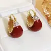 Aretes Rojos Retro con Esmalte de Goteo Diseño de Nicho Únicos Versátiles Reductores de Edad Moda de Lujo Ligero Aretes Estilo Hong Kong para Mujer