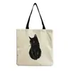 Directo de fábrica estilo coreano bolso de hombro práctico de dibujos animados moda versátil bolsa de mano lindo gato estampado bolsa de compras