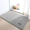 Alfombra de baño de color liso simple, engrosada y absorbente, alfombra de cachemir sintético, venta al por mayor transfronteriza, alfombrilla antideslizante para uso en el baño