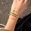 Elegante e Discreto Estilo Clássico Pulseira de Aço Inoxidável Dourado 18K com Pedra Pentagrama, Toque de Luxo Leve de Alta Qualidade, Joia Transfronteiriça com Senso de Design para Mulheres