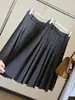 Saia Midi Meia-Calça de Lã Cinza Feminina 2026 Novo Estilo Outono Formato Pera Cintura Alta Emagrecimento Cobre os Quadris Linha A Plissada Midi