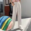 Calça de Seda de Gelo Wide Leg com Bolso de Aba para Verão Feminino, Calça Casual Drapeada para Pessoas Baixas, Efeito Emagrecedor Solto e Calça Versátil de Comprimento Médio para Mulheres