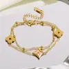 Pulsera de Gafas de Lectura de Acero de Titanio con Trébol de Cuatro Hojas Estilo Europeo y Americano para Mujer Chapada en Oro de 18K Accesorios de Joyería de Mano Estilo Ins de Alta Gama