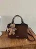 Bolsa de cubo de moda retro de alta gama 2026 transfronteriza, bolso de mano versátil casual, bolso de hombro, bolso cruzado