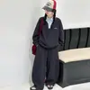 Nuevo conjunto transfronterizo: Conjunto deportivo, cómodo, versátil, estilo americano, sudadera de dos piezas simuladas y pantalón casual para niños y niñas, en stock
