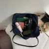 Bolsa de mano de mezclilla de estilo simple para mujer, gran capacidad, adecuada para ir al trabajo, bolso de hombro, nueva colección otoño 2026, bolsa grande para el trabajo y la escuela