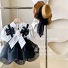 Conjunto de Dos Piezas para Niñas Estilo Coreano Verano 2026 Nuevo Elegante Top Floral + Falda Burbuja con Tirantes y Lazo Tendencia