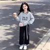 Nueva sudadera de cuadros patchwork para niñas, pantalones casuales y de moda de cuadros patchwork de pierna ancha, atuendo moderno estilo universitario