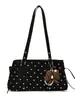Bolso de mujer de diseño nicho 2026 nuevo bolso de hombro cruzado de verano versión coreana ins bolso de mano de lunares bolso tote